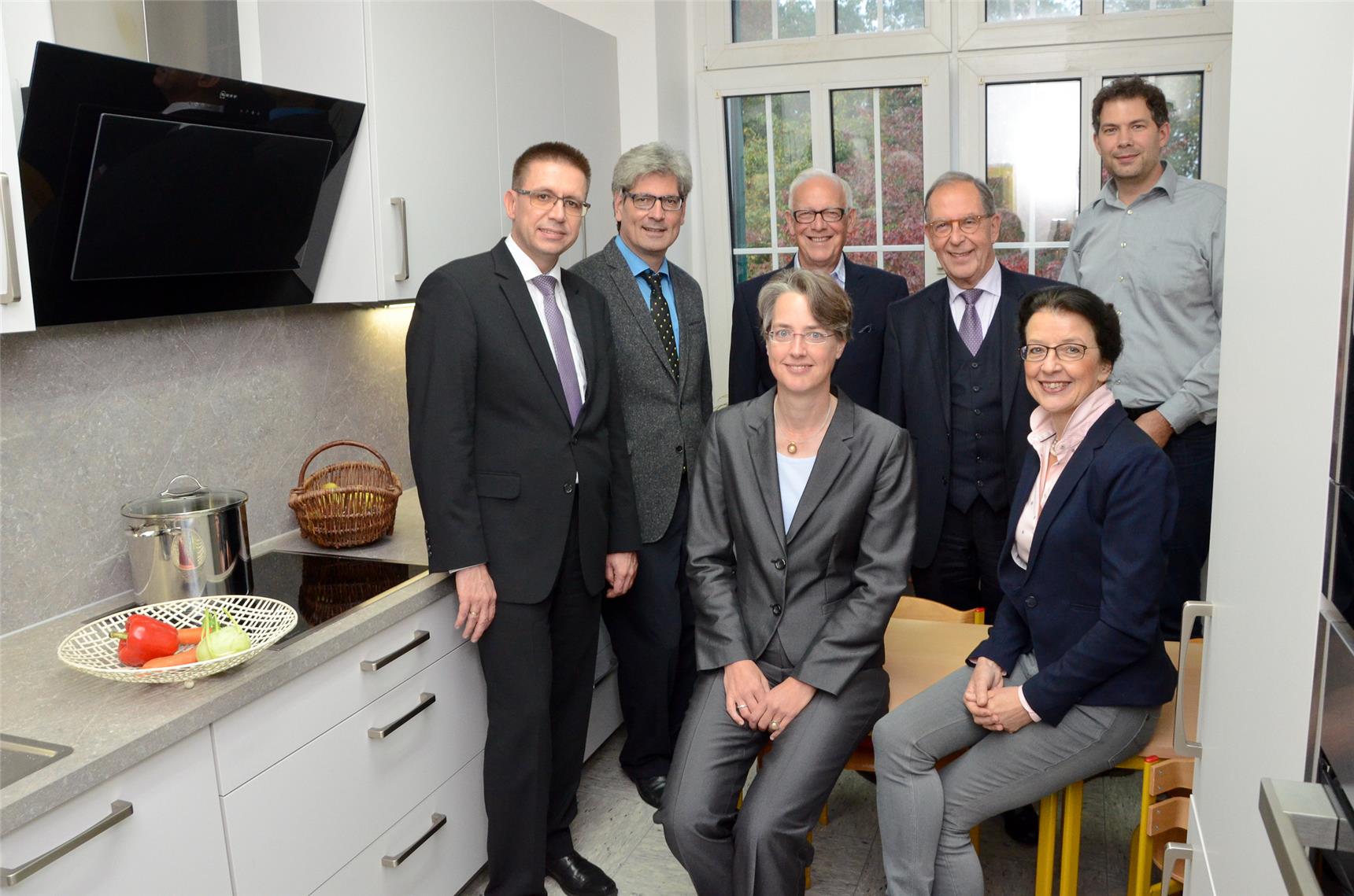 Menschengruppe in Küche