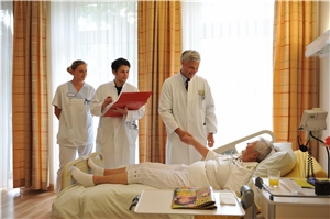 Visite am Krankenbett